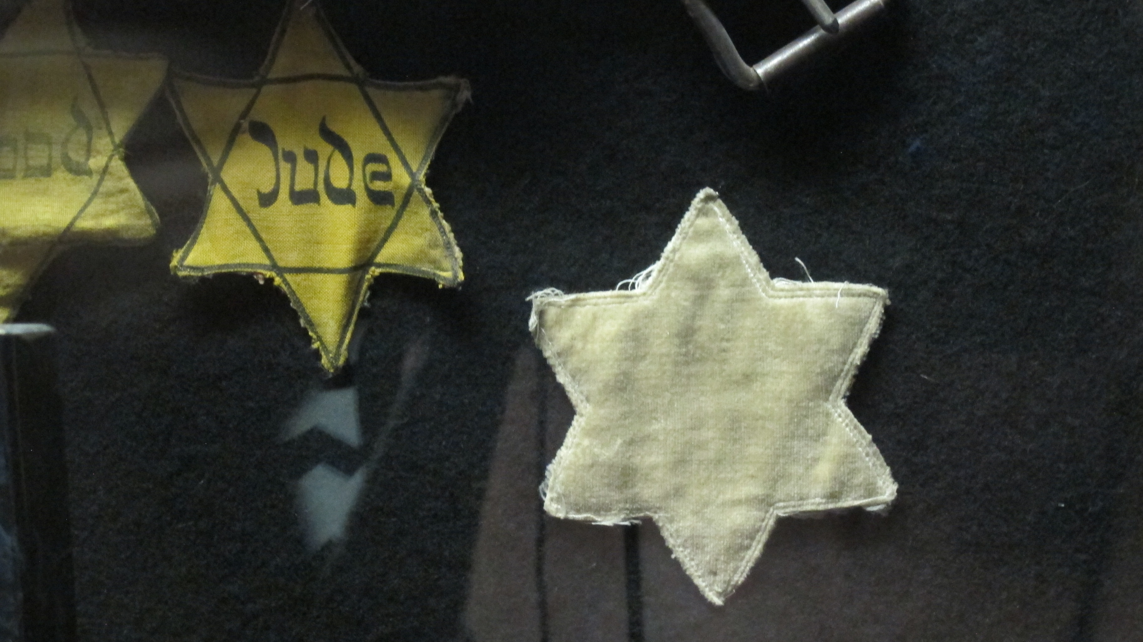 Auschwitz. Star of David patches were sewn on to the clothing of Jews during Nazi domination of Eastern Europe. On display at the Dohany Stree Synagogue, Budapest. Photo by Barbara Newhall