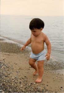 Eight-monkth-old baby boy on Lake Michigan Beach. Photo by BF Newhall