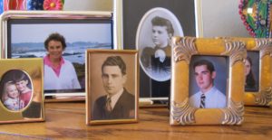 Family photos in frames on bedroom dresser. Photo by BF Newhall