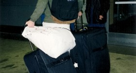 College student enters airport with suitcases to go to Carleton College for his freshman year. Photo by Barbara Falconer Newhall