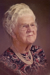 My Grandma Falconer at age 97 with pearls, up-do and 19th century-pince-nez. 
