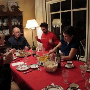 Family at Thanksgiving dinner table. Photo by Barbara Falconer Newhall
