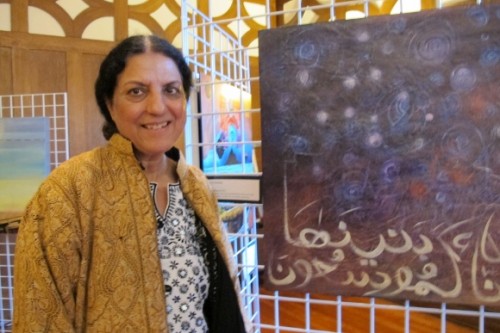 Berkeley CA artist Salma-Arastu with her painting Expansion of the universe. Photo by BF Newhall