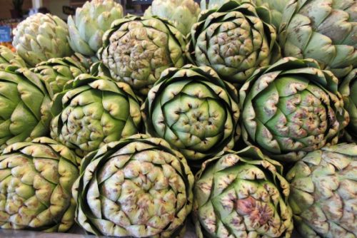 Artichokes stacked for sale at Whole Foods, Berkeley, CA. Photo by BF Newhall