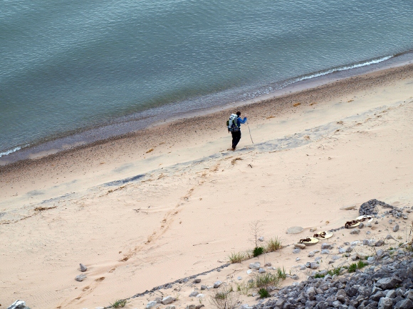 Loreen Niewenhuis trekking across sand beach. Niewenhuis photo.