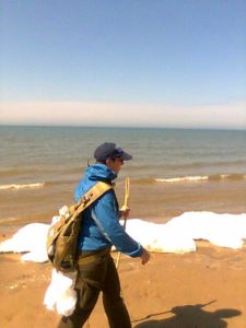 Loreen hikes alongside Lake Michigan snow drifts. Niewenhuis photo