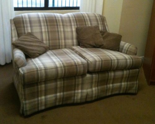 Love seat with plaid upholstery fabric. Photo by BF Newhall.