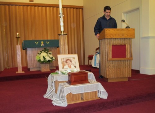 Peter Newhall reads Isaiah at his grandmothers memorial service, st. vincent church, pentwater, MI. Photo by BF Newhall