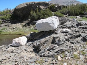 Glacial erratics piled on a sloping rock at Inyo National Forest, CA. Photo by BF Newhal
