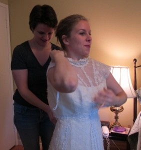 Bride-to-be tries on her future mother-in-law's wedding gown. Photo by BF Newhall