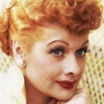 Lucille Ball with red lipstick and hair