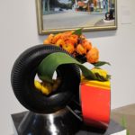 Peggy O'Neill used a tire and orange flowers to reflect Edward Hopper's painting "Portrait of Orleans"