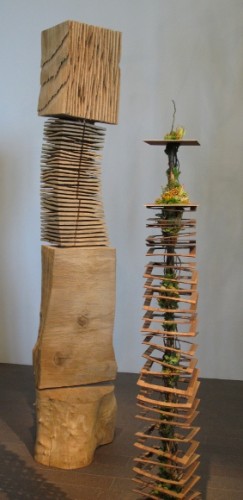 Patricia Gillespie of Sharpstick Studio created a tall floral arrangment to echo David Nash's wood sculpture Rip and Cross Cut Block Column, 2002. Photo by BF Newhall