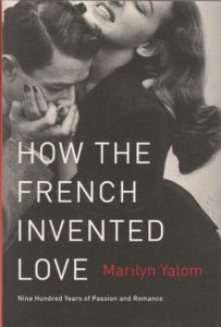 Cover of trade paperback by Marilyn Yalom, How the French Invented Love. A couple is kissing.
