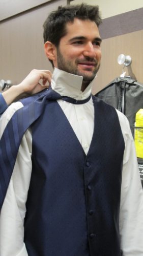 Groom tries on fashionable purple tie and vest at Men's Wearhouse, Eden Prairie, MN. photo by BF Newhall