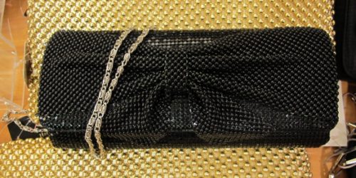 an evening handbag that's pretty and big . A black beaded evening bag for sale at Macy's for $40.