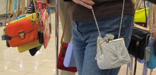 A small silver evening bag at Nordstrom with ruching and a chain sells for $268. Photo by BF Newhall