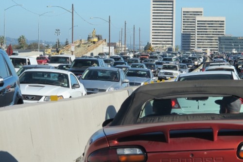 ten lanes of bumper to bumper freeway traffic in los angeles. photo by bf newhall
