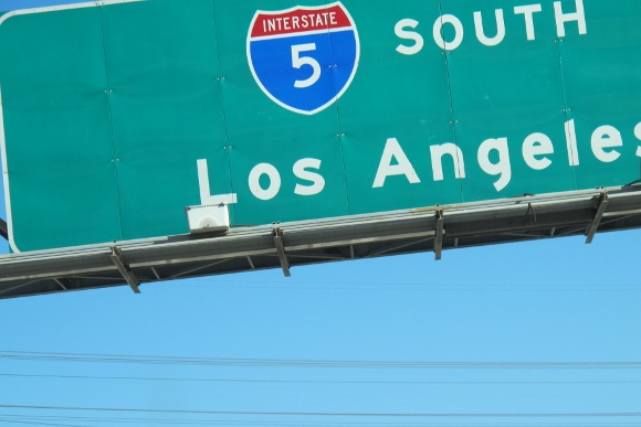 A green freeway sign on California's Interstate 5 South indicating Los Angeles. Photo by BF Newhall
