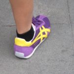 lavendar, purple and yellow sneakers with short black socks seen on a shanghai street. photo by bf newhall
