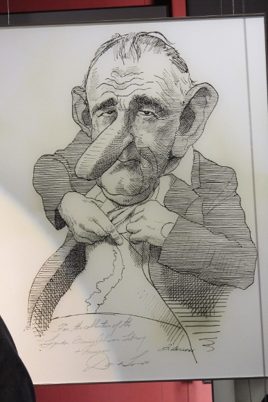 Cartoon of LBJ showing off his scar in the Johnson Presidential LIbrary in Austin, TX. Photo by BF Newhall