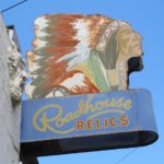 Roadhouse Antiques sign with an Indian chief with feathered bonnet, Austin, TX. Photo by BF Newhall
