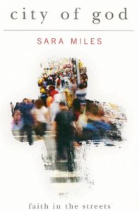 city of god book cover, by sara miles , shows a smudged cross with view of sidewalk with pedestrians.