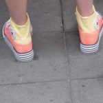 peach and yellow high-top shoes in shanghai. photo by bf newhall