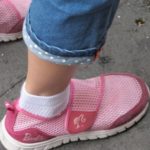 pink barbie doll shoes on a girl in shanghai. Photo by BF Newhall