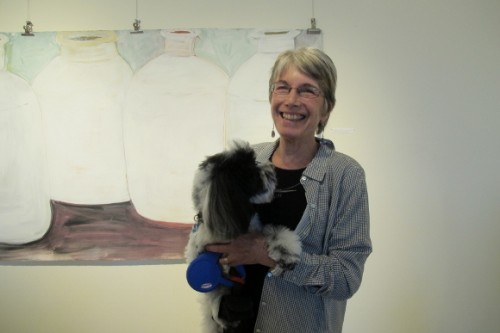 Berkeley CA ceramist Nancy Selvin with her dog in front of her large painting, 2013. Photo by BF Newhall