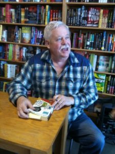 Armistead Maupin signs his book, "The Days of Ana Madrigal," at Book Passage, SF Ferry Building. Photo by BF Newhall