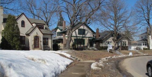 A traditional house in an snowy, tree lined neighborhood in southwest Minneapolis offered by Edina Realty. Photo by BF Newhall
