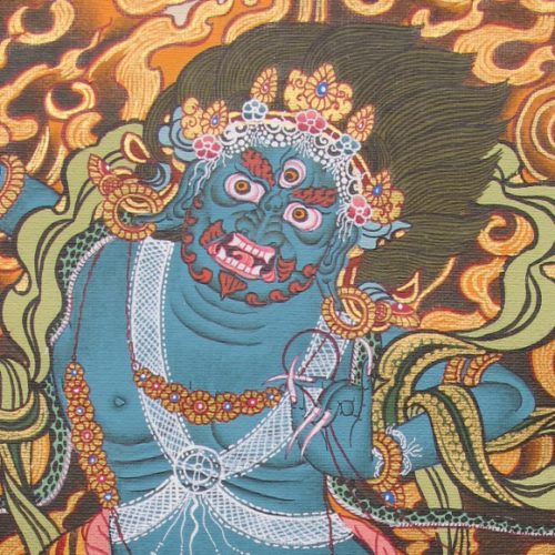 Yamantaka, fierce and blue faced Destroyer of the God of Death in Tibetan Buddhist tradition, detail of hand-painted thangka from Nepal. Photo by bf newhall