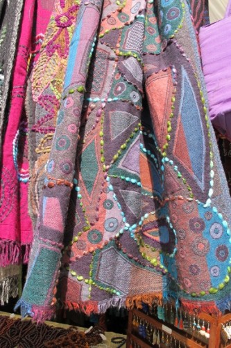 Colorful, one-of-a-kind wool scarves boiled and embroidered were $65 each at the Himalayan Fair 2014. Photo by BF Newhall