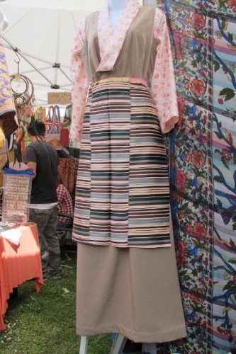 Tibetan traditional flowered blouse, silk skirt and heavy silk striped apron, $95 at the Himalayan Fair Berkeley, 2014. Photo by BF Newhall