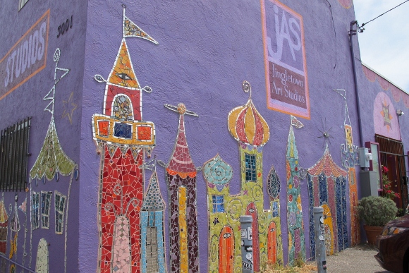 The facade of Jingletown Art Studios in Oakland, CA, is decorated with colorful mosaics of fanciful castles and towers. Photo by BF Newhall