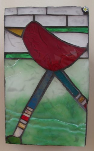 a small mosaic with red bird and green background at Institute of Mosaic Art. Photo by BF Newhall