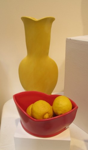 At the  Berkeley Potters Guild, Berkeley, CA, ceramics by Sarah Gregory: A yellow vase,  and a red bowl8. Photo by BF Newhall