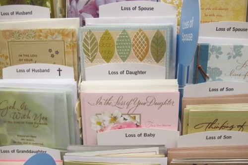 condolence cards in a Hallmark Store rack. Photo by Barbara Newhall