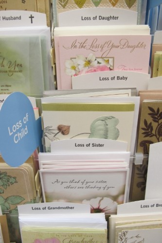 Sympathy, condolence cards on display at Hallmark store. Loss of a child, etc. Photo by Barbara Newhall