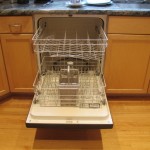 An open 2000 Maytag Jetclean Quiet Plus dishwasher with racks visible that finally wore out after 14 years. Photo by Barbara Newhall