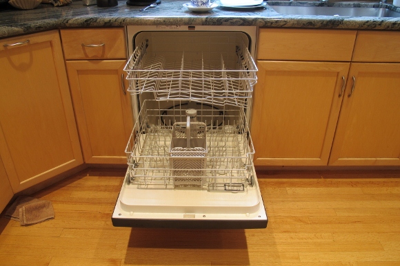 An open 2000 Maytag Jetclean Quiet Plus dishwasher with racks visible that finally wore out after 14 years. Photo by Barbara Newhall