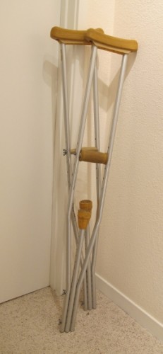 a pair of old alumunium crutches with disintegrating padding. Photo by Barbara Newhall