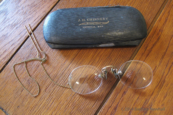 My grandmorther's pince-nez with gold chain, hairpin and laminated metal case from J.H. Chinnery, optometrist, Scottville, Michigan. Photo by Barbara Newhall