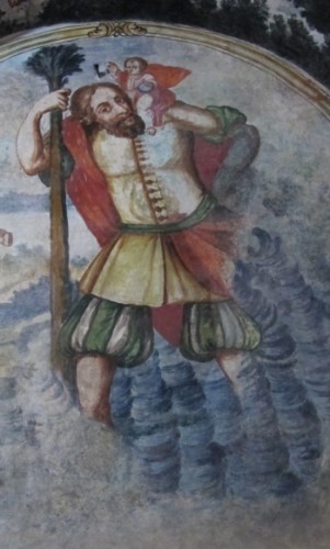 The Catholic Church no longer considers St. Christopher a saint, yet his image exists aroudn the world, this one on a wall of the church at Atotonilco, Mexico. Photo by Barbara Newhall