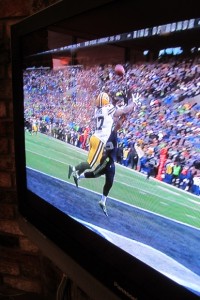 TV screenshot of two players going for the ball in the touchdown zone of a nfl 2015 superbowl playoff, seattle-greenbay. Photo by Barbara Newhall