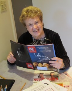 Author Barbara Falconer Newhall opens her copy of Publishers Weekly magazine, which had just arrived in the mail, to find that her book, Wrestling with God, got a starred review in the January 21, 2015, issue. Photo by Jon Newhall