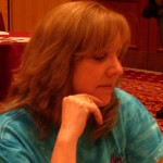 cindy weyant newhall at the 2010 national open chess tournament in Las Vegas pondering a move. Photo by Barbara Newhall