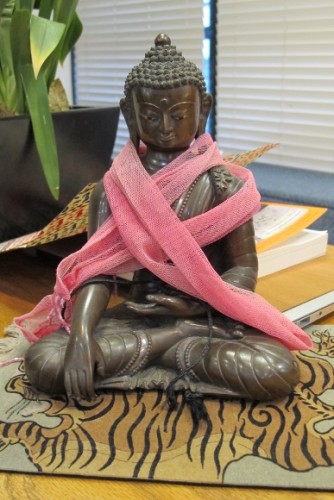 Jeff Greenwald, author of "Shopping for Buddhas," settled on purchasing this Buddha during his shopping serach in Nepal. It is the touching the Earth Buddha mudra. Photo by Barbara Newhall writers