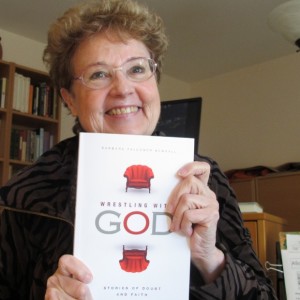 Barbara Falconer Newhall, author of "Wrestling with God," is shown with a copy of her book. 2015. Newhall is offering free copies of her book through the Goodreads Giveaway program. Photo by Barbara Newhall